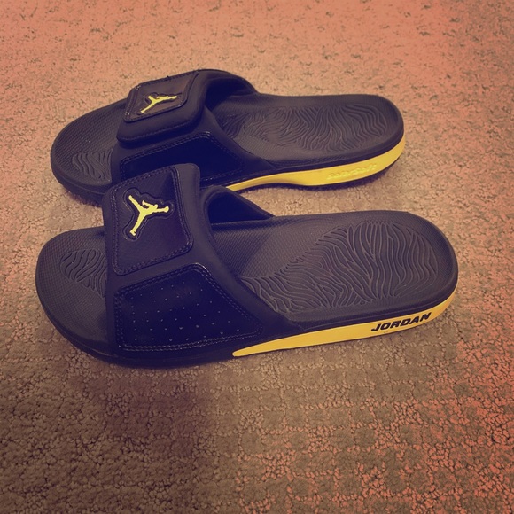 black and gold jordan slides